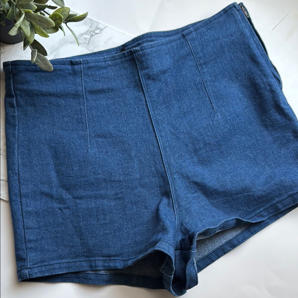 Forever 21 denim shorts size 27 has some stretch.